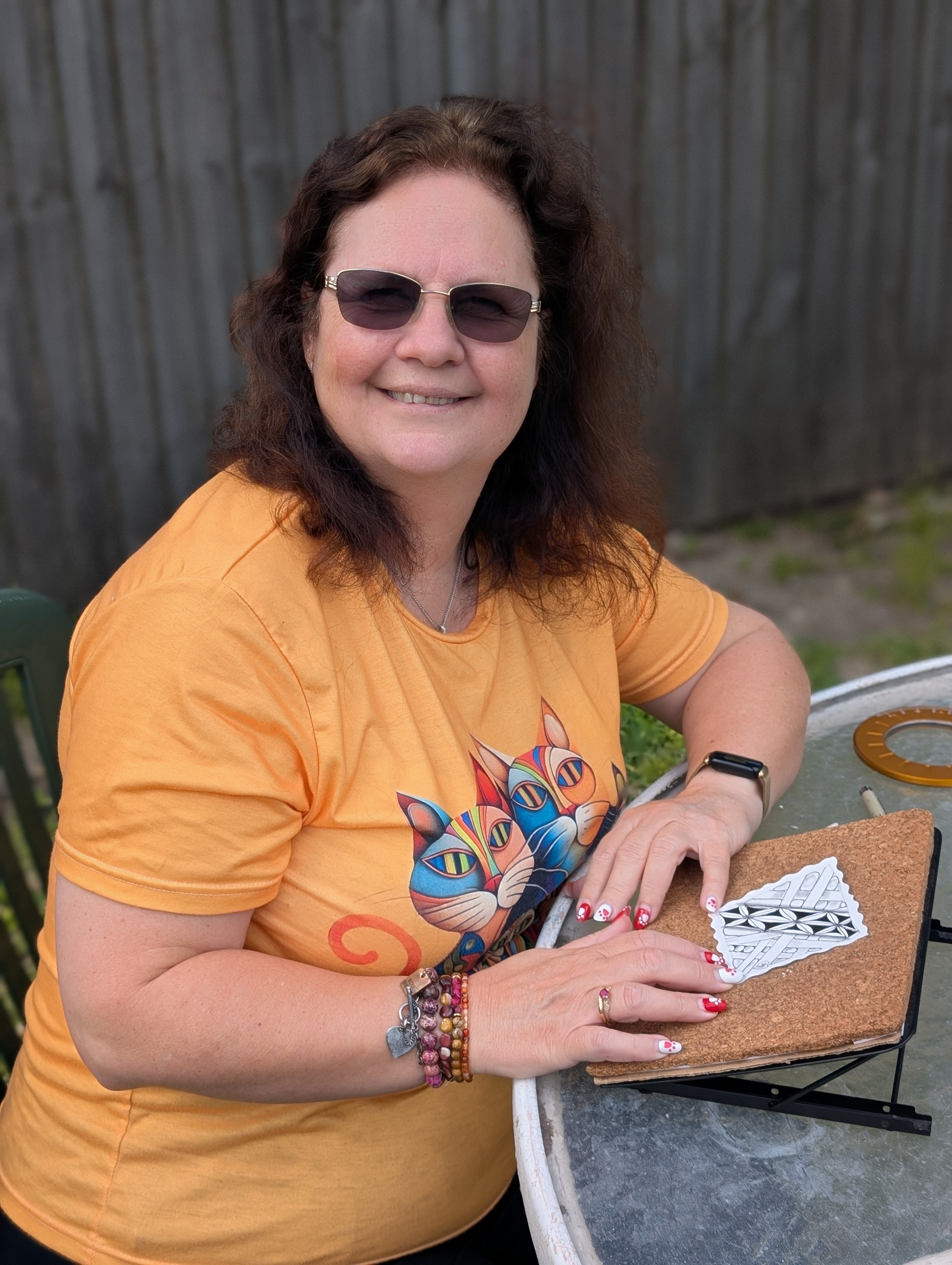 Sue, Certified Zentangle® Teacher and founder of Tangled Glory